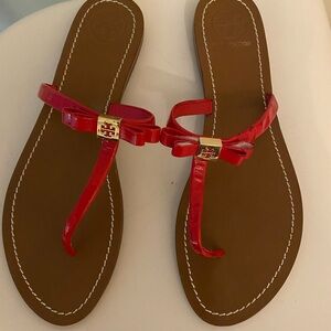 Women’s Tory Burch red flat sandals. Worn once but has dust bag.